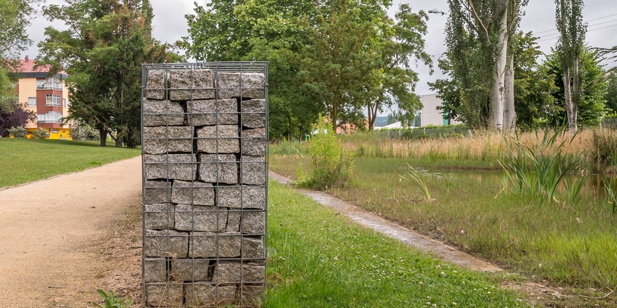 Granite gabion wall in a park landscape