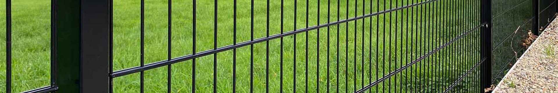Stacked welded wire mesh panels in an outdoor storage yard