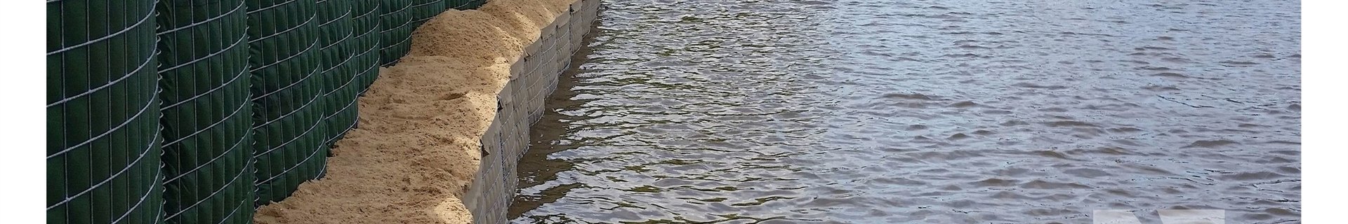 Defense barrier product with welded wire mesh and geotextile lining