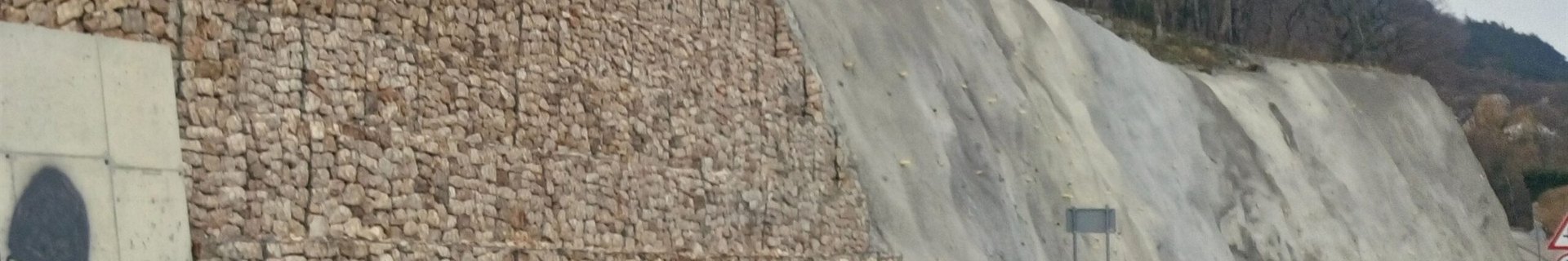 Stone-filled gabion retaining wall in landscape use